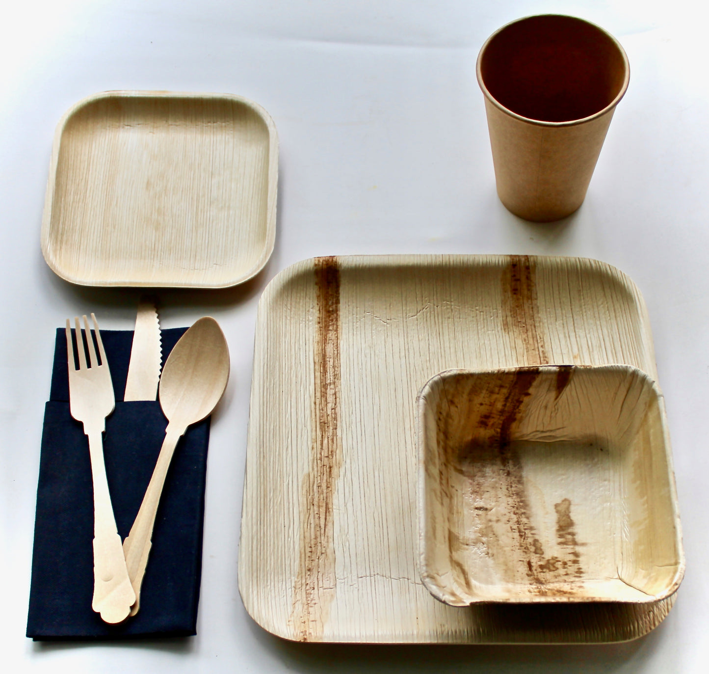 palm leaf plates 10 pice Square 9.5" -10 Pic 6" Square Bowl - 10 Pic square 6" - 10 Pic coup - 30 pic utensils - 10 pic 6"x9" Triangle - 10 pic 5" Bowl    and    30  pic cutler - 50 pic napkin