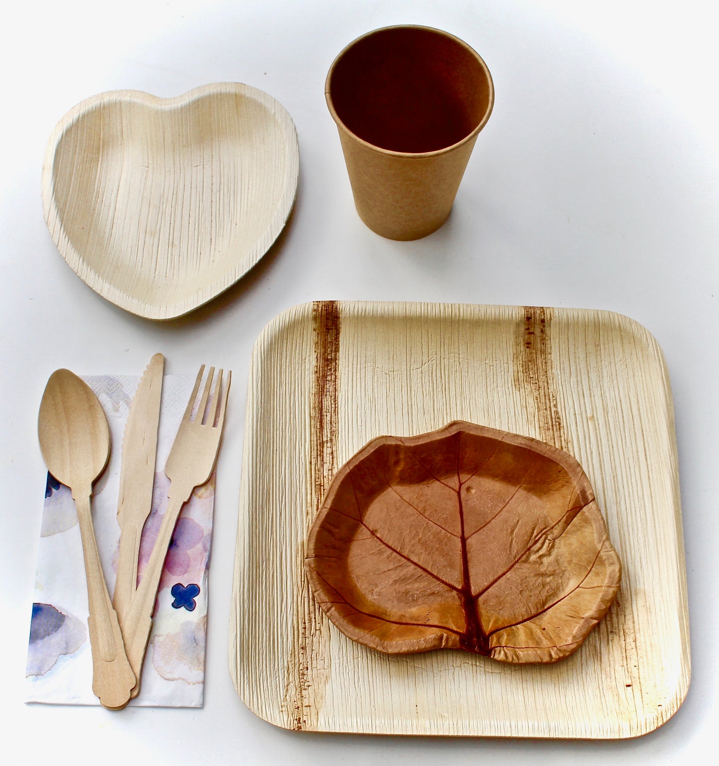 Bamboo Type Palm Leaf Plate 20 Pic 10" Deep Square - 20 Pic Sea grape 7" Dessert plate - 60 pic Utensils - 20 Pic Heart ^" - 20 Pic cup - 20 pic Napkin